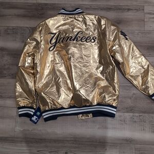 New York Yankees gold satin jacket made by the brand Starter Size Large